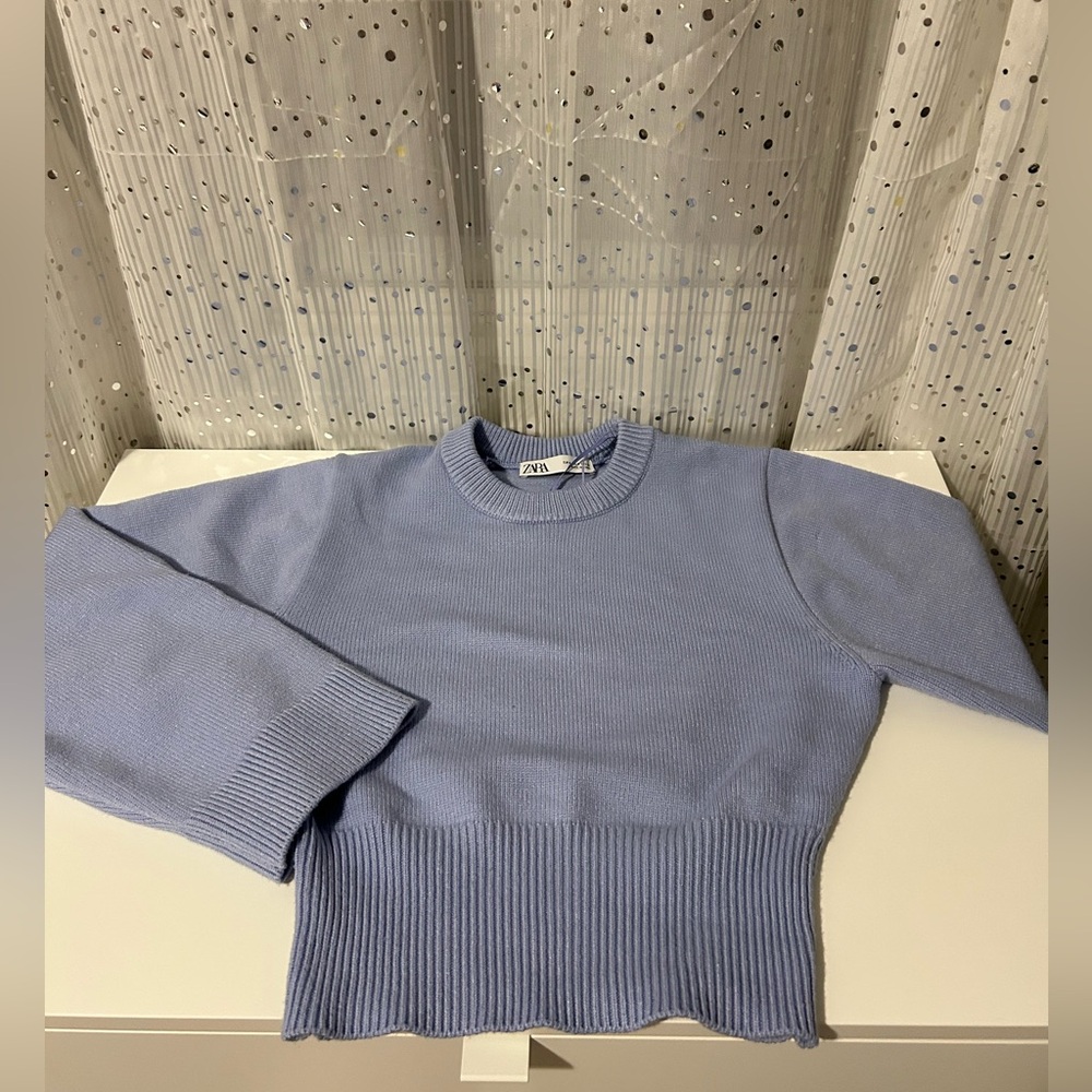 Area wide sleeve sweater